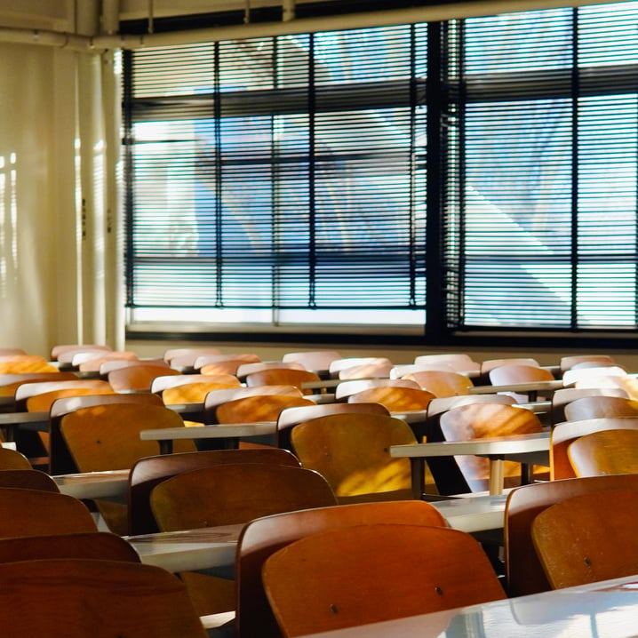 Rows of Tables and Chairs in the Classroom 